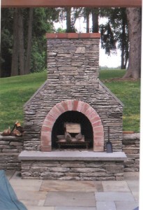 Fieldstone-fireplace-with-bluestone-hearth